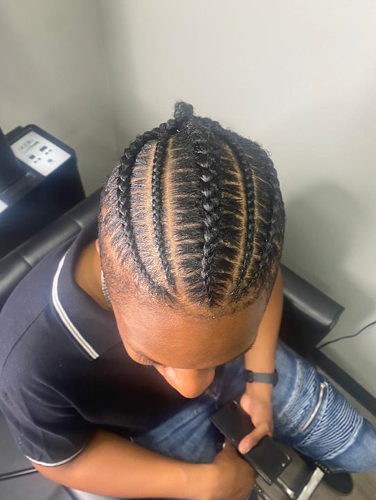 Detailed protective braid work by Queen Dee's